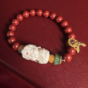 Tara Sitting Lotus Cinnabar Bracelet: Buddhist Art Jewelry